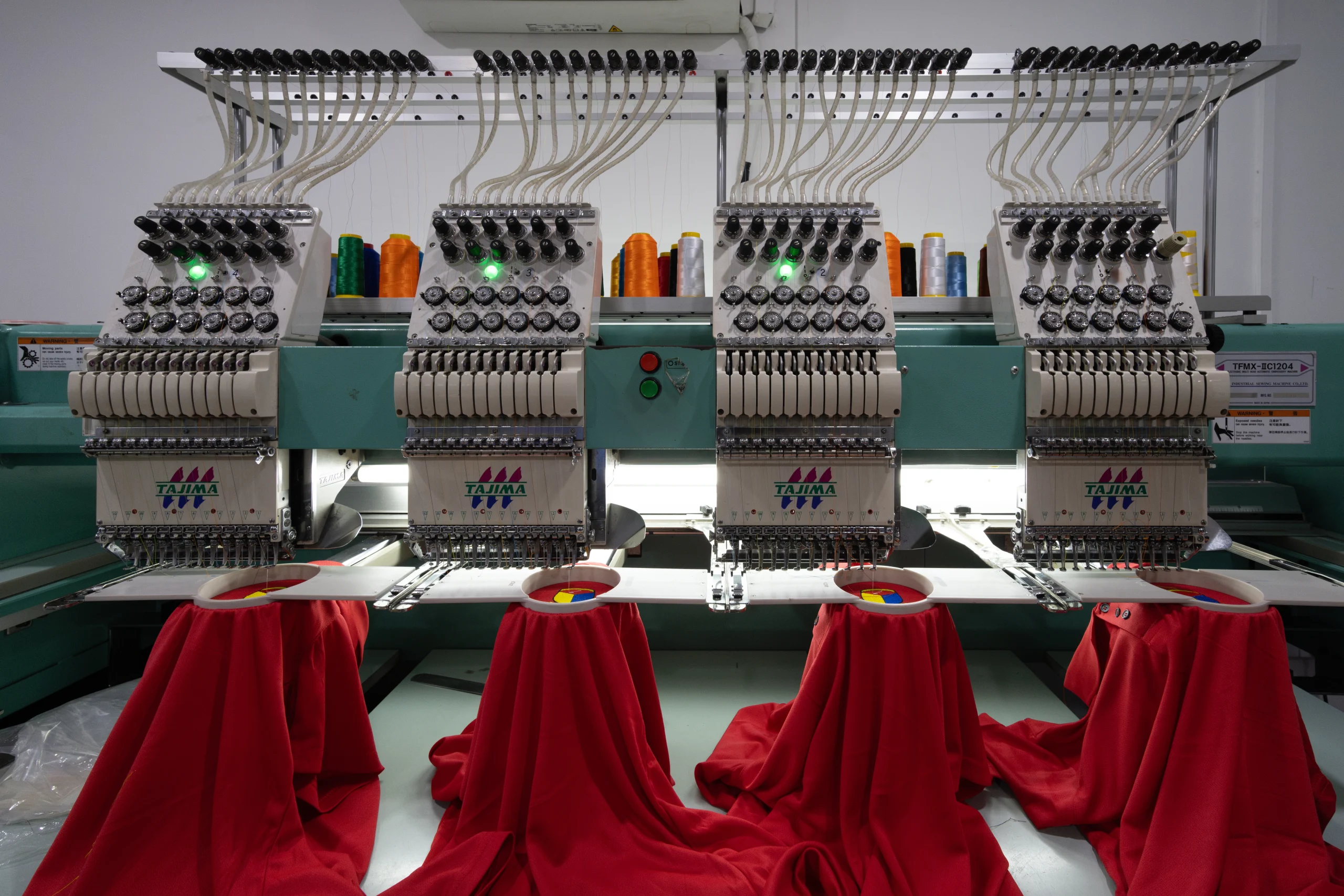 VistaCreate-839198522-stock-photo-kota-kinabalu-sabah-malaysia-october-2024-industrial-embroidery-machines-working